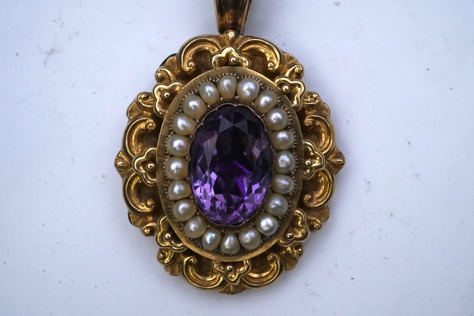 An early Victorian sentimental amethyst and half pearl pendant, circa 1843